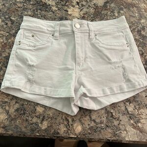 YMI white jean shorts. Mid rise stretch, stitched pockets.